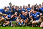 24 September 2023; Tullamore players celebrate with the cup after the Offaly County Senior Football Championship final match between Ferbane and Tullamore at Glenisk O'Connor Park in Tullamore, Offaly. Photo by Eóin Noonan/Sportsfile