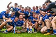 24 September 2023; Tullamore players celebrate with the cup after the Offaly County Senior Football Championship final match between Ferbane and Tullamore at Glenisk O'Connor Park in Tullamore, Offaly. Photo by Eóin Noonan/Sportsfile