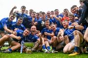 24 September 2023; Tullamore players celebrate with the cup after the Offaly County Senior Football Championship final match between Ferbane and Tullamore at Glenisk O'Connor Park in Tullamore, Offaly. Photo by Eóin Noonan/Sportsfile