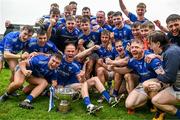 24 September 2023; Tullamore players celebrate with the cup after the Offaly County Senior Football Championship final match between Ferbane and Tullamore at Glenisk O'Connor Park in Tullamore, Offaly. Photo by Eóin Noonan/Sportsfile