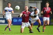 24 September 2023; Brian Fenton of Raheny in action against Josh Kelly of St Vincents during the Dublin Senior Football Championship quarter-final match between Raheny and St Vincents at Parnell Park in Dublin. Photo by Tyler Miller/Sportsfile