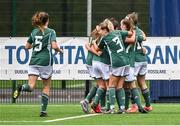 24 September 2023; Northern Ireland players celebrate their side's first goal, scored by Keri Halliday, hidden, during the Women's U19 international friendly match between Northern Ireland and Republic of Ireland at Blanchflower Stadium in Belfast. Photo by Ben McShane/Sportsfile
