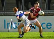 24 September 2023; Brian Fenton of Raheny evades the tackle of Sean Lambe of St Vincents during the Dublin Senior Football Championship quarter-final match between Raheny and St Vincents at Parnell Park in Dublin. Photo by Tyler Miller/Sportsfile