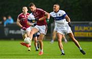 24 September 2023; Cian Ivers of Raheny in action against Josh Kelly of St Vincents during the Dublin Senior Football Championship quarter-final match between Raheny and St Vincents at Parnell Park in Dublin. Photo by Tyler Miller/Sportsfile