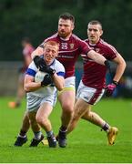 24 September 2023; Sean Lambe of St Vincents is tackled by Paddy Reid of Raheny during the Dublin Senior Football Championship quarter-final match between Raheny and St Vincents at Parnell Park in Dublin. Photo by Tyler Miller/Sportsfile