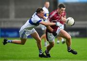 24 September 2023; Brian Fenton of Raheny in action against Shane O'Leary of St Vincents during the Dublin Senior Football Championship quarter-final match between Raheny and St Vincents at Parnell Park in Dublin. Photo by Tyler Miller/Sportsfile