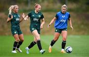 24 September 2023; Haley Nolan with Savannah McCarthy, left, and Saoirse Noonan, right, during a Republic of Ireland women training session at MTK Budapest Training Ground in Budapest, Hungary. Photo by Stephen McCarthy/Sportsfile