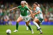 23 September 2023; Denise O'Sullivan of Republic of Ireland in action against Joely Andrews of Northern Ireland during the UEFA Women's Nations League B1 match between Republic of Ireland and Northern Ireland at Aviva Stadium in Dublin. Photo by Eóin Noonan/Sportsfile