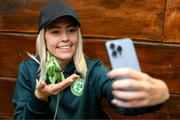 25 September 2023; Republic of Ireland's Denise O'Sullivan with Flash, a chameleon, at Zoo Café in Budapest, Hungary, during some down time ahead of their UEFA Women's Nations League B1 match against Hungary, on Tuesday. Photo by Stephen McCarthy/Sportsfile