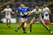 24 September 2023; Niall Furlong of Tullamore is tackled by Jack Clancy of Ferbane during the Offaly County Senior Football Championship final match between Ferbane and Tullamore at Glenisk O'Connor Park in Tullamore, Offaly. Photo by Eóin Noonan/Sportsfile