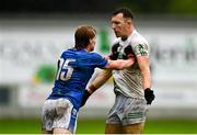 24 September 2023; Conor Butler of Ferbane tussles with Cormac Egan of Tullamore during the Offaly County Senior Football Championship final match between Ferbane and Tullamore at Glenisk O'Connor Park in Tullamore, Offaly. Photo by Eóin Noonan/Sportsfile