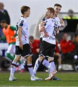 25 September 2023; Daryl Horgan of Dundalk celebrates with teammates John Martin, right, and Johannes Yli-Kokko, left, after scoring their side's second goal during the SSE Airtricity Men's Premier Division match between Dundalk and Cork City at Oriel Park in Dundalk, Louth. Photo by Ben McShane/Sportsfile