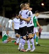 25 September 2023; Daryl Horgan of Dundalk celebrates with teammate Paul Doyle, right, after scoring their side's third goal during the SSE Airtricity Men's Premier Division match between Dundalk and Cork City at Oriel Park in Dundalk, Louth. Photo by Ben McShane/Sportsfile