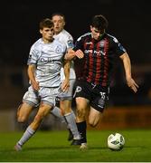 25 September 2023; James Clarke of Bohemians in action against Will Jarvis of Shelbourne during the SSE Airtricity Men's Premier Division match between Bohemians and Shelbourne at Dalymount Park in Dublin. Photo by Tyler Miller/Sportsfile