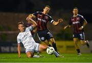 25 September 2023; Keith Buckley of Bohemians is tackled by Brian McManus of Shelbourne during the SSE Airtricity Men's Premier Division match between Bohemians and Shelbourne at Dalymount Park in Dublin. Photo by Tyler Miller/Sportsfile