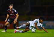 25 September 2023; Gbemi Arubi of Shelbourne is tackled by Jordan Flores of Bohemians during the SSE Airtricity Men's Premier Division match between Bohemians and Shelbourne at Dalymount Park in Dublin. Photo by Tyler Miller/Sportsfile