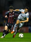 25 September 2023; Jordan Flores of Bohemians in action against Shane Griffin of Shelbourne during the SSE Airtricity Men's Premier Division match between Bohemians and Shelbourne at Dalymount Park in Dublin. Photo by Stephen Marken/Sportsfile