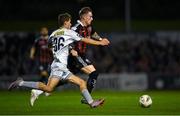 25 September 2023; Danny Grant of Bohemians in action against Lewis Temple of Shelbourne during the SSE Airtricity Men's Premier Division match between Bohemians and Shelbourne at Dalymount Park in Dublin. Photo by Stephen Marken/Sportsfile