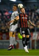 25 September 2023; Danny Grant of Bohemians in action against Jonathan Lunney of Shelbourne during the SSE Airtricity Men's Premier Division match between Bohemians and Shelbourne at Dalymount Park in Dublin. Photo by Stephen Marken/Sportsfile