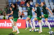26 September 2023; Republic of Ireland players, including Claire O'Riordan, centre, warm-up before the UEFA Women's Nations League B1 match between Hungary and Republic of Ireland at Hidegkuti Nándor Stadium in Budapest, Hungary. Photo by Stephen McCarthy/Sportsfile