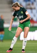 26 September 2023; Megan Connolly of Republic of Ireland sprays insect repellent before the UEFA Women's Nations League B1 match between Hungary and Republic of Ireland at Hidegkuti Nándor Stadium in Budapest, Hungary. Photo by Stephen McCarthy/Sportsfile