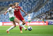 26 September 2023; Heather Payne of Republic of Ireland in action against Laura Palakovics of Hungary during the UEFA Women's Nations League B1 match between Hungary and Republic of Ireland at Hidegkuti Nándor Stadium in Budapest, Hungary. Photo by Stephen McCarthy/Sportsfile