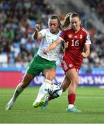 26 September 2023; Katie McCabe of Republic of Ireland in action against Boglárka Vida of Hungary during the UEFA Women's Nations League B1 match between Hungary and Republic of Ireland at Hidegkuti Nándor Stadium in Budapest, Hungary. Photo by Stephen McCarthy/Sportsfile