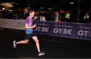 26 September 2023; Competitors come to the finish during the Grant Thornton Corporate 5K Team Challenge at City Quay in Dublin. Photo by David Fitzgerald/Sportsfile