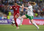 26 September 2023; Amber Barrett of Republic of Ireland in action against Laura Kovács of Hungary during the UEFA Women's Nations League B1 match between Hungary and Republic of Ireland at Hidegkuti Nándor Stadium in Budapest, Hungary. Photo by Stephen McCarthy/Sportsfile