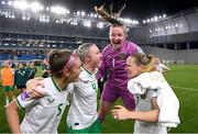 26 September 2023; Republic of Ireland players, from left, Caitlin Hayes, Louise Quinn, Courtney Brosnan and Diane Caldwell celebrate after their side's victory in the UEFA Women's Nations League B1 match between Hungary and Republic of Ireland at Hidegkuti Nándor Stadium in Budapest, Hungary. Photo by Stephen McCarthy/Sportsfile