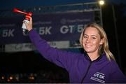 26 September 2023; Olympian Derval O'Rourke sounds the horn to start the Grant Thornton Corporate 5K Team Challenge at City Quay in Dublin. Photo by David Fitzgerald/Sportsfile