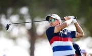 27 September 2023; Rickie Fowler of USA watches his tee shot on the second hole during a practice round before the 2023 Ryder Cup at Marco Simone Golf and Country Club in Rome, Italy. Photo by Ramsey Cardy/Sportsfile