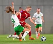 26 September 2023; Laura Palakovics of Hungary is tackled by Kyra Carusa of Republic of Ireland during the UEFA Women's Nations League B1 match between Hungary and Republic of Ireland at Hidegkuti Nándor Stadium in Budapest, Hungary. Photo by Stephen McCarthy/Sportsfile