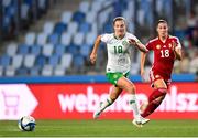 26 September 2023; Kyra Carusa of Republic of Ireland in action against Laura Kovács of Hungary during the UEFA Women's Nations League B1 match between Hungary and Republic of Ireland at Hidegkuti Nándor Stadium in Budapest, Hungary. Photo by Stephen McCarthy/Sportsfile