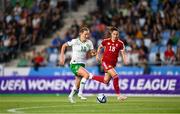 26 September 2023; Kyra Carusa of Republic of Ireland in action against Laura Kovács of Hungary during the UEFA Women's Nations League B1 match between Hungary and Republic of Ireland at Hidegkuti Nándor Stadium in Budapest, Hungary. Photo by Stephen McCarthy/Sportsfile