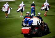 27 September 2023; Justin Thomas, left, and Jordan Spieth of USA in a buggy on the second fairway during a practice round before the 2023 Ryder Cup at Marco Simone Golf and Country Club in Rome, Italy. Photo by Ramsey Cardy/Sportsfile