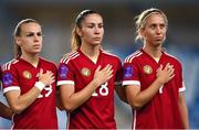 26 September 2023; Hungary players, from left, Dóra Zeller, Laura Kovács and Zsanett Kaján stand for the playing of the National Anthem before the UEFA Women's Nations League B1 match between Hungary and Republic of Ireland at Hidegkuti Nándor Stadium in Budapest, Hungary. Photo by Stephen McCarthy/Sportsfile