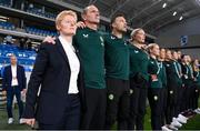 26 September 2023; Republic of Ireland interim head coach Eileen Gleeson and coaches, from left, Colin Healy, Richie Fitzgibbon and Emma Byrne stand for the playing of the National Anthem before the UEFA Women's Nations League B1 match between Hungary and Republic of Ireland at Hidegkuti Nándor Stadium in Budapest, Hungary. Photo by Stephen McCarthy/Sportsfile