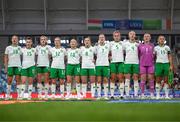 26 September 2023; Republic of Ireland players, from left, Kyra Carusa, Lucy Quinn, Heather Payne, Lily Agg, Denise O'Sullivan, Tyler Toland, Diane Caldwell, Caitlin Hayes, Louise Quinn, goalkeeper Courtney Brosnan and Katie McCabe stand for the playing of the National Anthem before the UEFA Women's Nations League B1 match between Hungary and Republic of Ireland at Hidegkuti Nándor Stadium in Budapest, Hungary. Photo by Stephen McCarthy/Sportsfile