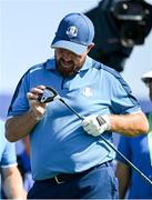 27 September 2023; Shane Lowry of Europe inspects his driver on the 16th tee box during a practice round before the 2023 Ryder Cup at Marco Simone Golf and Country Club in Rome, Italy. Photo by Brendan Moran/Sportsfile