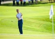 28 September 2023; Sean Keeling of Europe chips onto the eighth green during the singles matches on day three of the Junior Ryder Cup at Marco Simone Golf and Country Club in Rome, Italy. Photo by Brendan Moran/Sportsfile