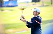 28 September 2023; USA captain Zach Johnson with the Ryder Cup trophy during a team photocall before the 2023 Ryder Cup at Marco Simone Golf and Country Club in Rome, Italy. Photo by Ramsey Cardy/Sportsfile