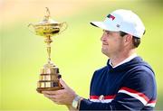 28 September 2023; USA captain Zach Johnson with the Ryder Cup trophy during a team photocall before the 2023 Ryder Cup at Marco Simone Golf and Country Club in Rome, Italy. Photo by Ramsey Cardy/Sportsfile