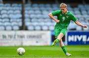 28 September 2023; Michael Noonan of Republic of Ireland shoots to score his side's first goal, a penalty, during the U16 international friendly match between Republic of Ireland and Finland at Weavers Park in Drogheda, Louth. Photo by Tyler Miller/Sportsfile