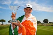 28 September 2023; Sean Keeling of Europe celebrates with the trophy after the singles matches on day three of the Junior Ryder Cup at Marco Simone Golf and Country Club in Rome, Italy. Photo by Brendan Moran/Sportsfile