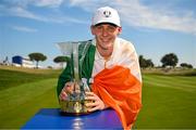 28 September 2023; Sean Keeling of Europe celebrates with the trophy after the singles matches on day three of the Junior Ryder Cup at Marco Simone Golf and Country Club in Rome, Italy. Photo by Brendan Moran/Sportsfile