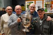 28 September 2023; Local Carrick Hill residents, from left, Raymond Horne, Frank Dempsey, Sean Maskey and Brian Hillick with the cup as descendants of Alton United receive the Sports Direct Men’s FAI Cup for the first time in Carrick Hill, Belfast on the 100th anniversary of the Club winning the Cup as the only Belfast team to win the competition in its history. Photo by David Fitzgerald/Sportsfile