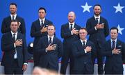 28 September 2023; USA players, back from left, Wyndham Clark, Rickie Fowler, Brian Harman and Max Homa and front, form left, Scottie Scheffler, Jordan Spieth, Justin Thomas and captain Zach Johnson stand for the playing of their national anthem during the opening ceremony of the 2023 Ryder Cup at Marco Simone Golf and Country Club in Rome, Italy. Photo by Brendan Moran/Sportsfile