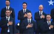 28 September 2023; USA players, back from left, Wyndham Clark, Rickie Fowler and Brian Harman and front, form left, Scottie Scheffler, Jordan Spieth and Justin Thomas stand for the playing of their national anthem during the opening ceremony of the 2023 Ryder Cup at Marco Simone Golf and Country Club in Rome, Italy. Photo by Brendan Moran/Sportsfile