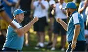 29 September 2023; Sepp Straka, left, and Shane Lowry of Europe celebrate winning the fourth hole during the morning foursomes matches on day one of the 2023 Ryder Cup at Marco Simone Golf and Country Club in Rome, Italy. Photo by Ramsey Cardy/Sportsfile